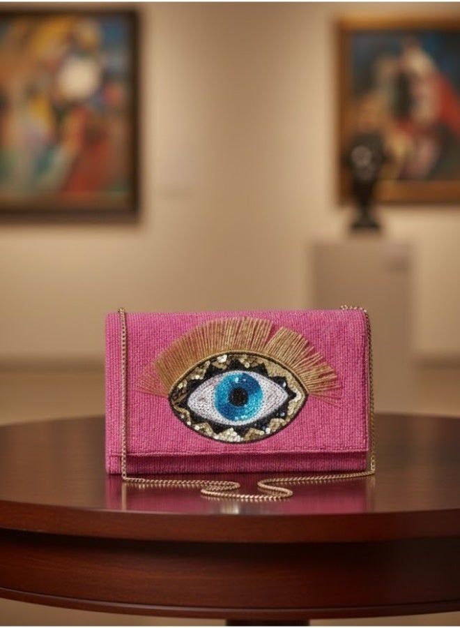 zoba Elegant women's wallet bag with a gold chain - can be worn crossbody or clutch - distinctive and luxurious eye design for outings and occasions (fuchsia) - Image 1